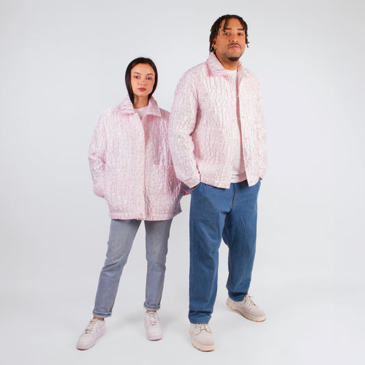 Lucewear: femme et homme portant une veste mixte rose